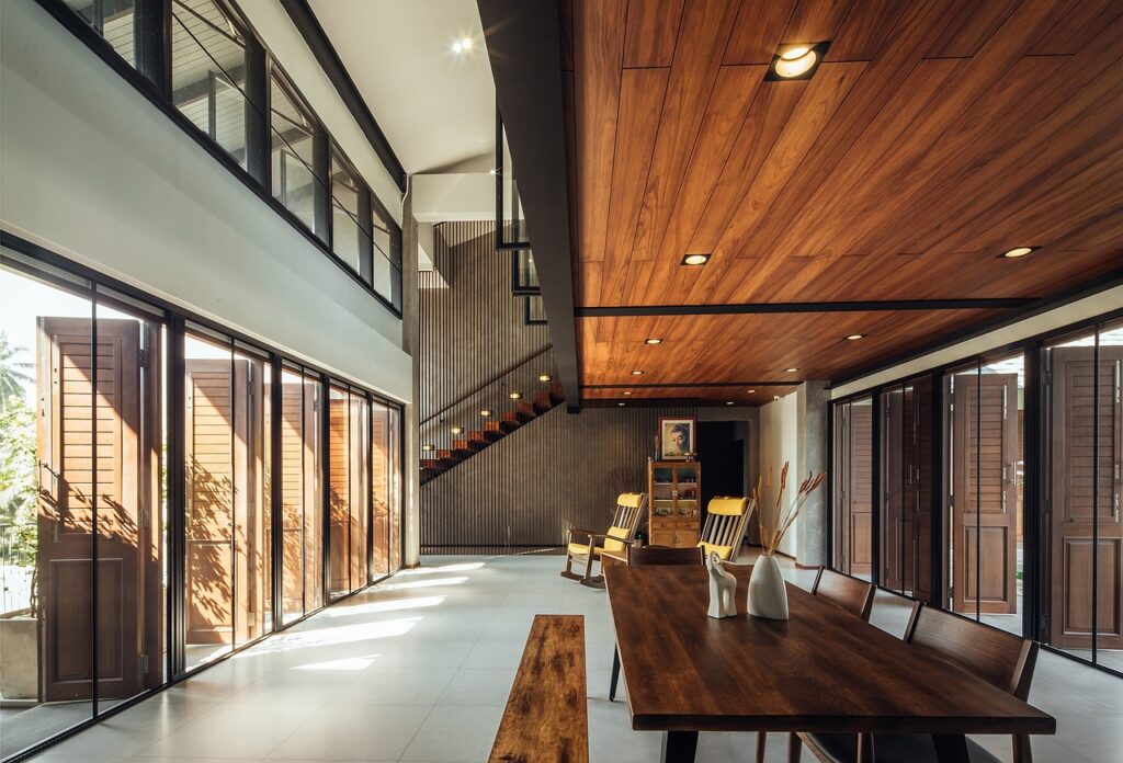 Large, open windows of a villa designed for tropical climate, optimizing ventilation and panoramic views