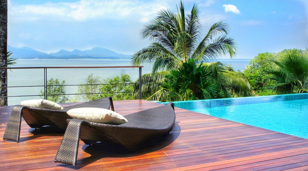 Aerial view of beachfront properties in Koh Samui, showcasing the intersection of tourism and real estate development.